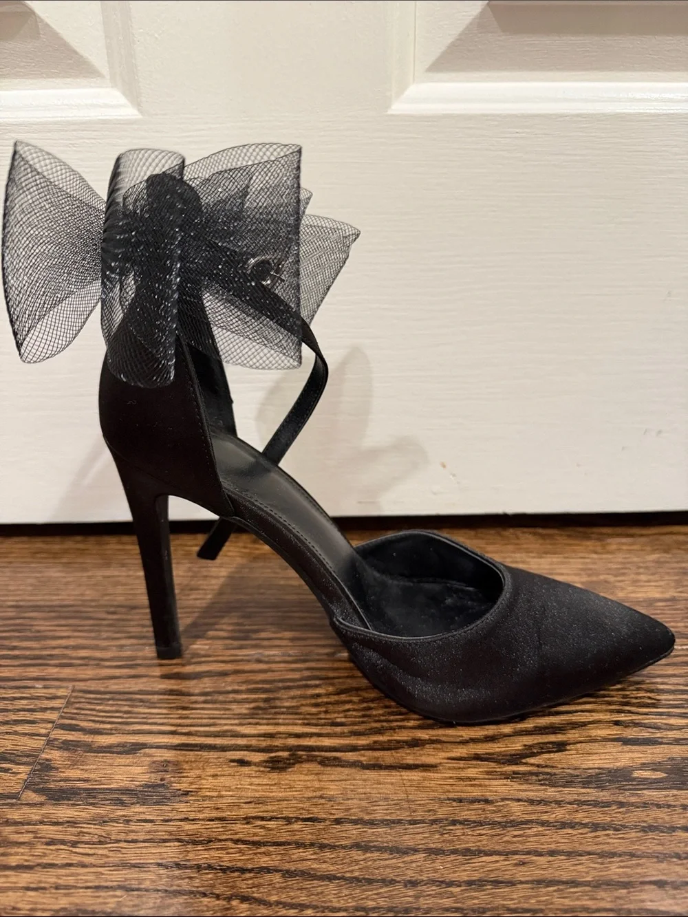 Elegant Black Pointed-Toe Ankle-Strap Heels with Bow Accent